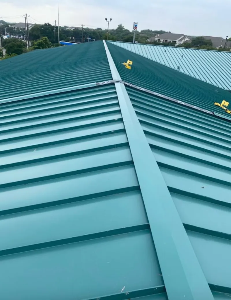 Green commercial metal roof ridge and valley for Metal Roof Repair in McGregor